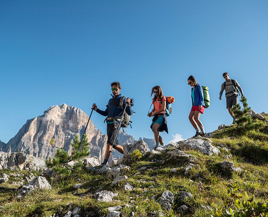 people are hiking on mountain