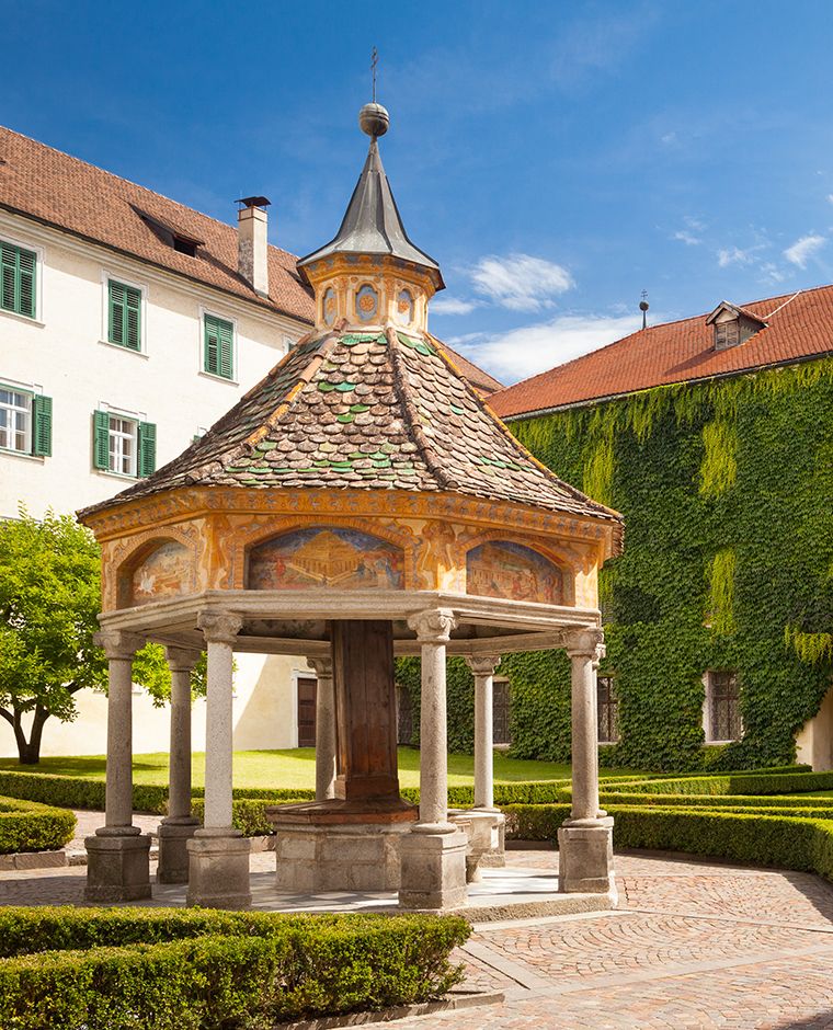 The ancient wonder well of Novacella Abbey, South Tyrol, Bressanone, Italy.