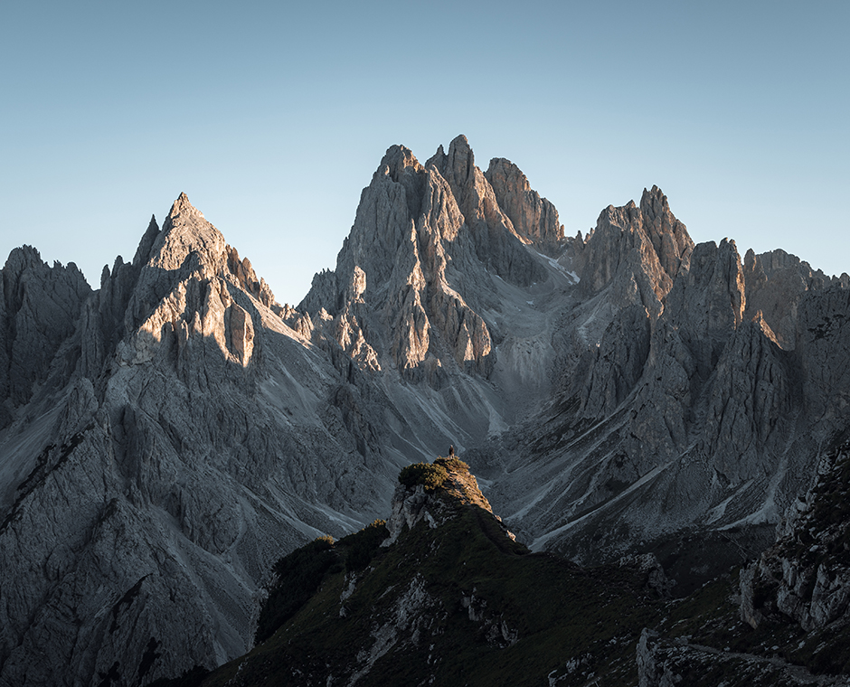 Panorama of the Dolomites with rocky peaks illuminated by natural light