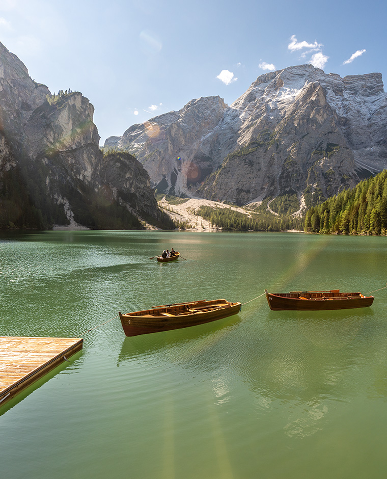 Boats on Lake Braies with mountain panorama in Alta Pusteria