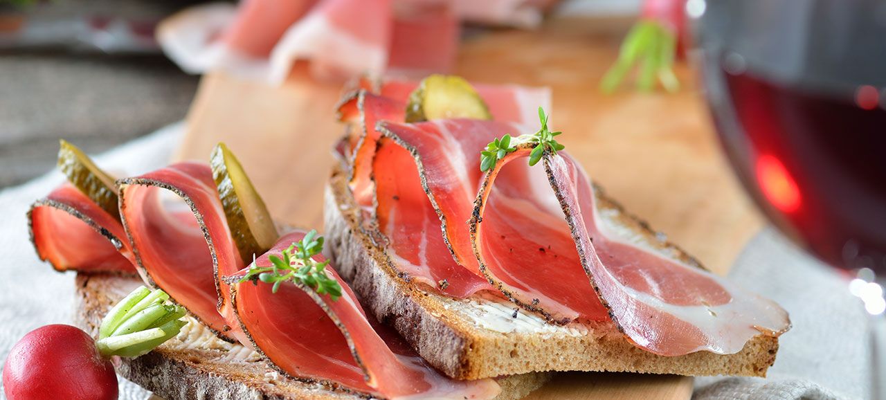 The Speck, typical specialty at the South Tyrol Gourmet Festival of Bolzano