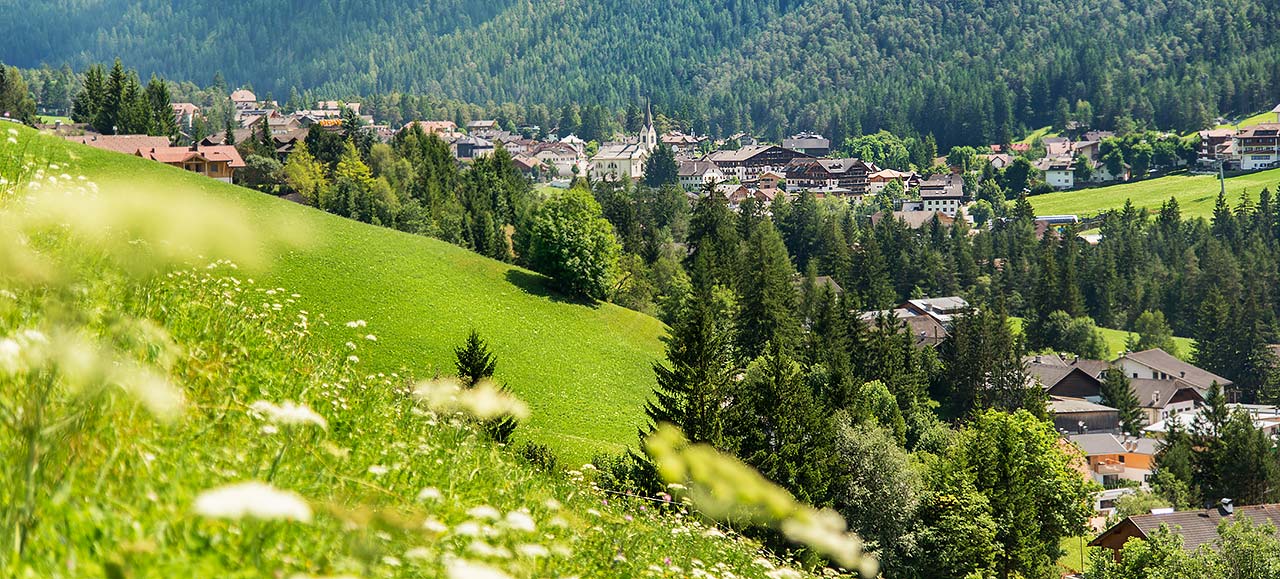 Beautiful green landscape and the picturesque village of San Vigilio di Marebbe