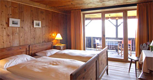 Authentic style of a bedroom at Hotel Bad Dreikirchen in Barbiano