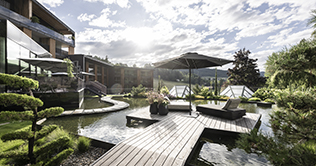 The lake and the Alpine Sport & Wellness Hotel Viktoria