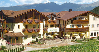 Hotel Baumwirt at Castelrotto in summer time